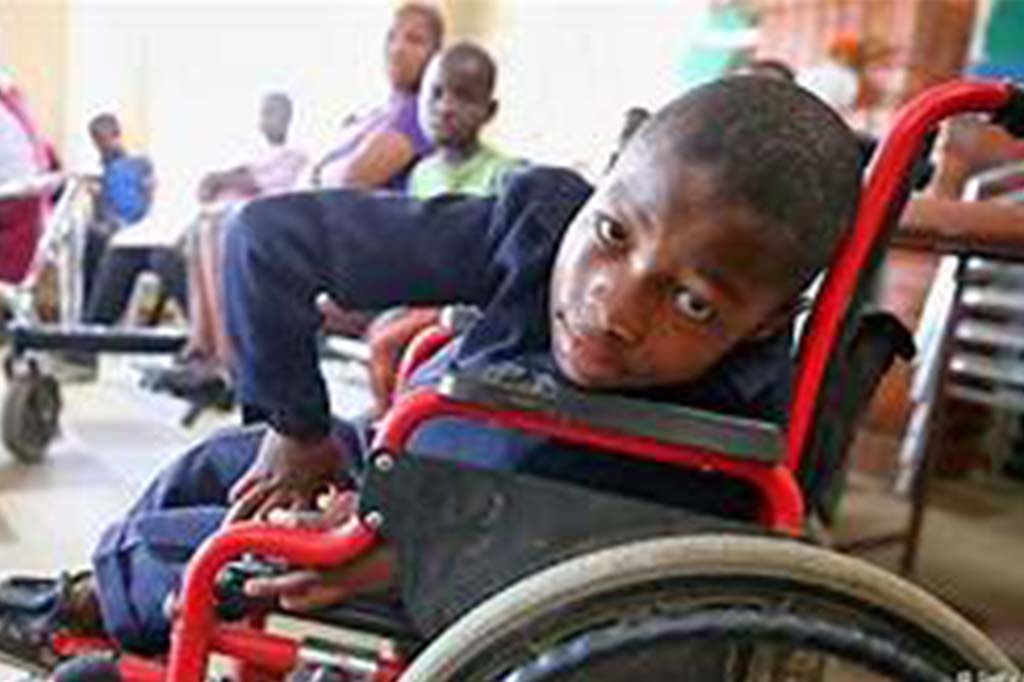 young boy in wheelchair